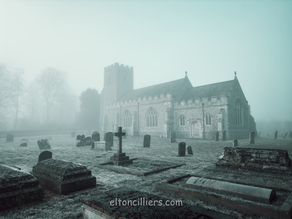 West Acre All Saints Church on a very moody, misty morning. Travel photography. The Touring Eye