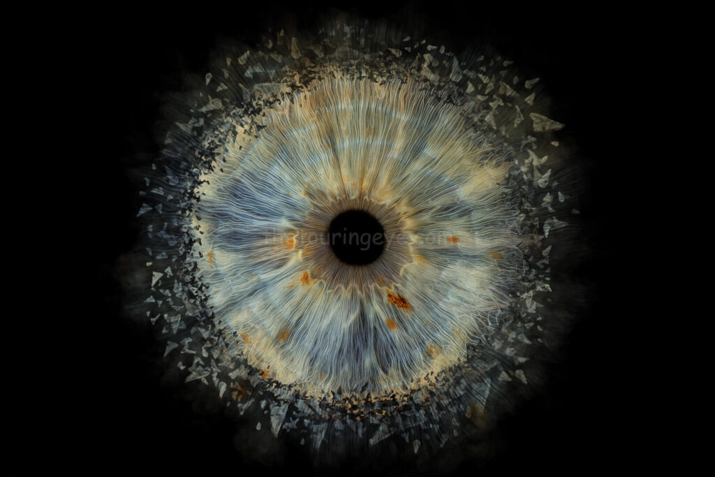 A dark blue eye iris exploding. Iris photography. Eye photography. The Touring Eye. Eye art. Eye artwork.